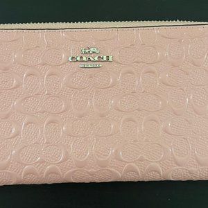 Pink patent leather Coach wallet